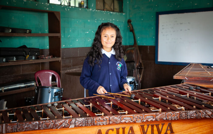 Sofia Playing the Marimba