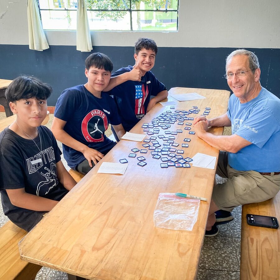 Tim with Students on English Tutoring